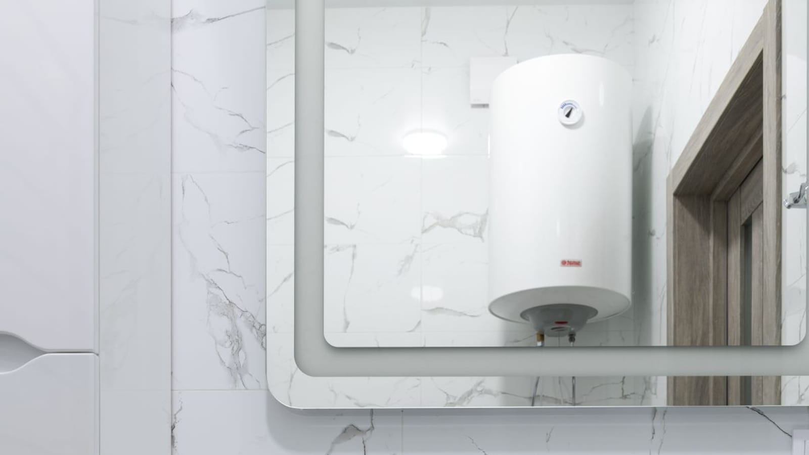 Lavabo blanco con grifo cromado bajo un espejo en el que se refleja un termo eléctrico vertical colgado en la pared de enfrente
